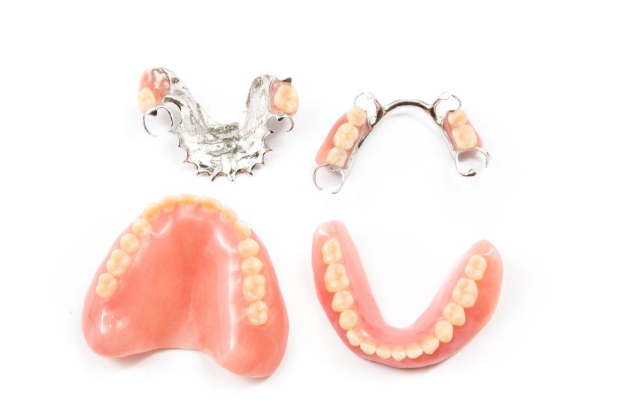 At ROC Dental Group, we’re experts in crafting custom-fitted partial and complete dentures designed to restore your smile.